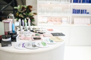 Wide selection of skincare and beauty products displayed in a modern retail setting.